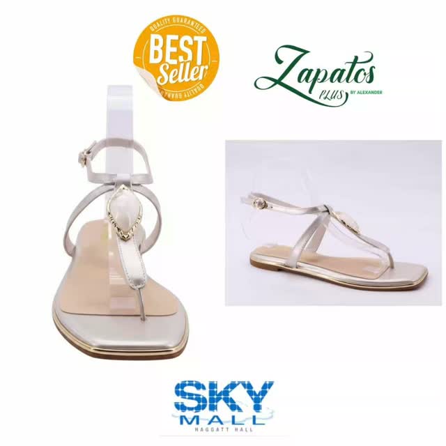 Ladies White Slippers – $75 at Zapatos Plus