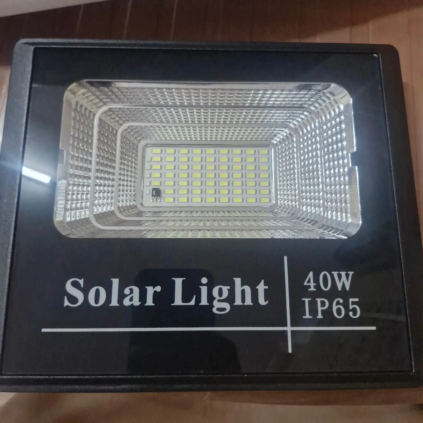 40W Solar Flood Light with Remote, Solar Panel & Screws – $85