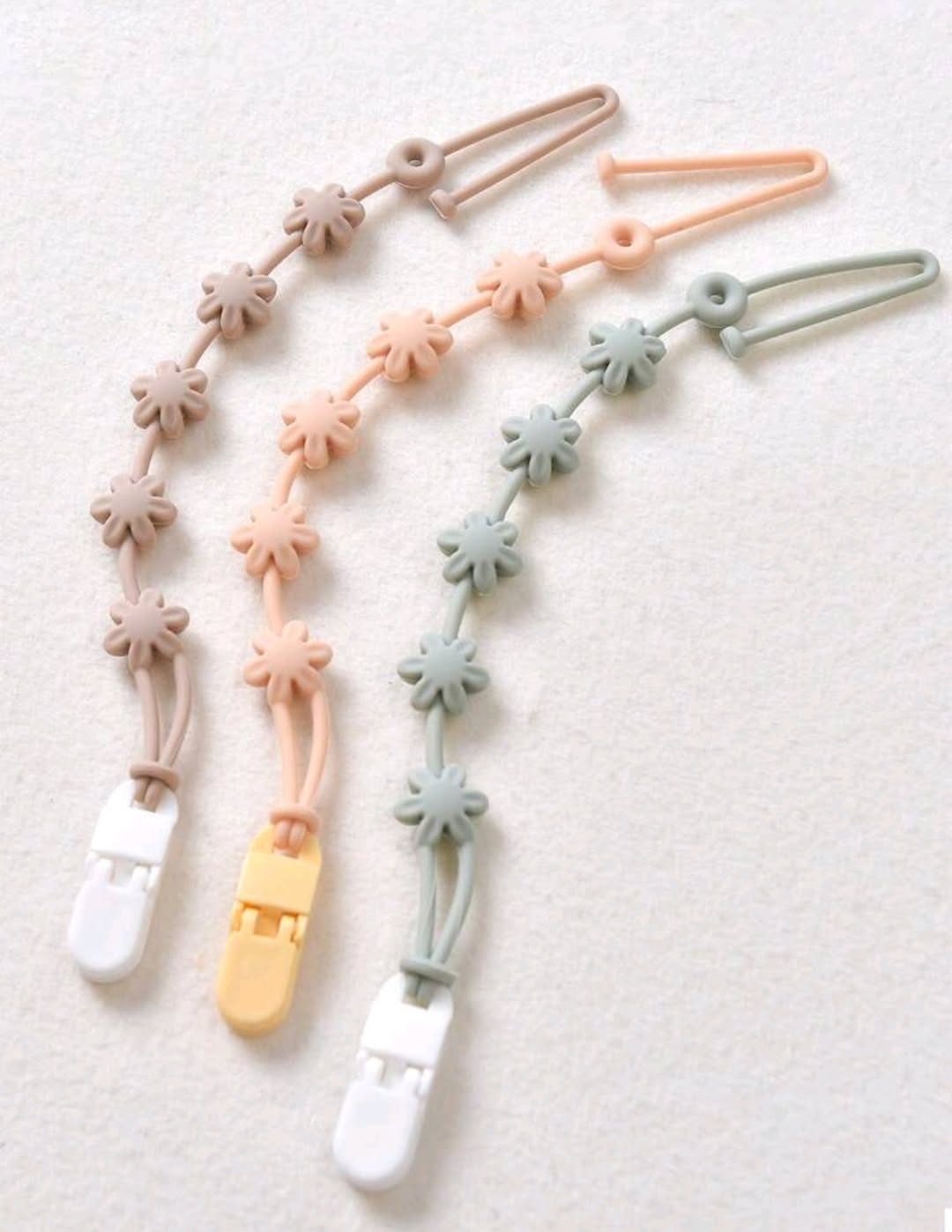 Silicone Pacifier Clips – $8 Each